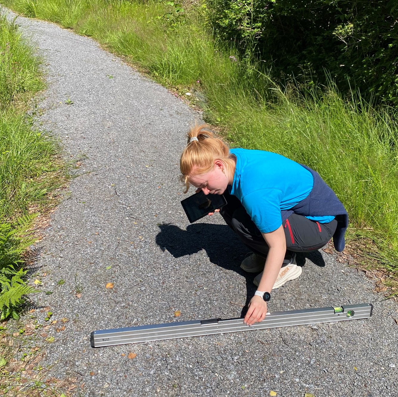 Måling av stiens helning med vater.