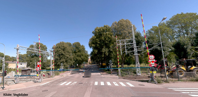 Bilde av vegbom ved planovergang.